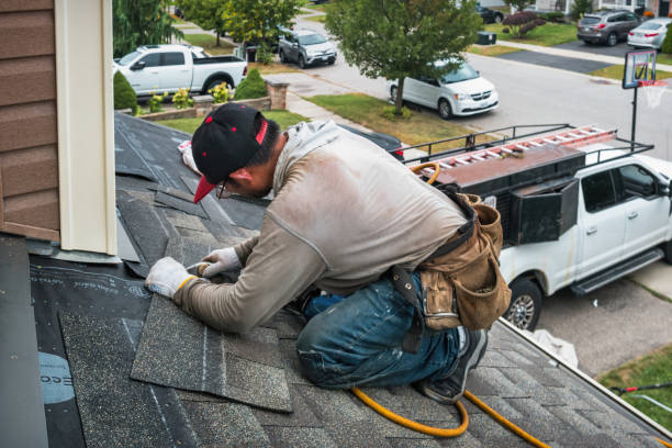 Professional Roofing technician working in Harrisburg, NC